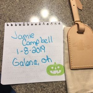 New luggage tag authentic